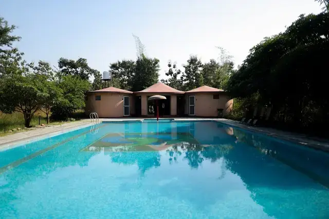 pool side stay rooms madhuban eco retreat bhopal